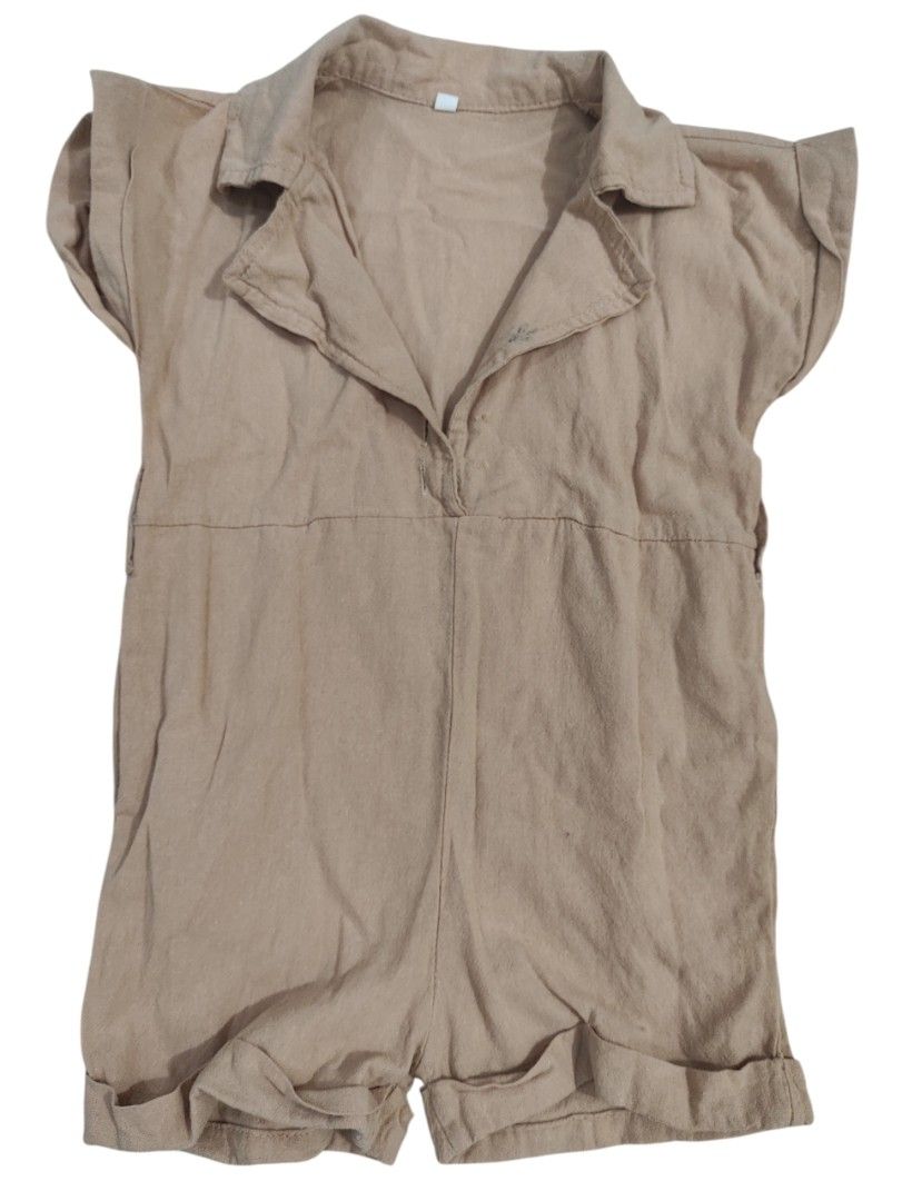 Beige Collared Short Sleeve Romper Playsuit (Category: Babies & Kids Fashion) located in Taguig. Submitted by rai.a.c (Listing ID 1465754162, Image 1). Description: With missing buttons and stains. Can be used as pamabahay.