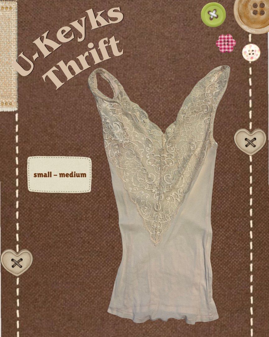 Beige Lace Tank Top Camisole (Small ~ Medium) (Category: Sleeveless) located in Cavite. Submitted by ukeyks (Listing ID 1465710886, Image 1). Description: - Color: Beige - Style: Fitted camisole with deep V-neck and intricate floral lace trim - Size: Fits small to medium frames - Condition: Good, with a small tear near the shoulder strap (highlighted in close-up photo) .