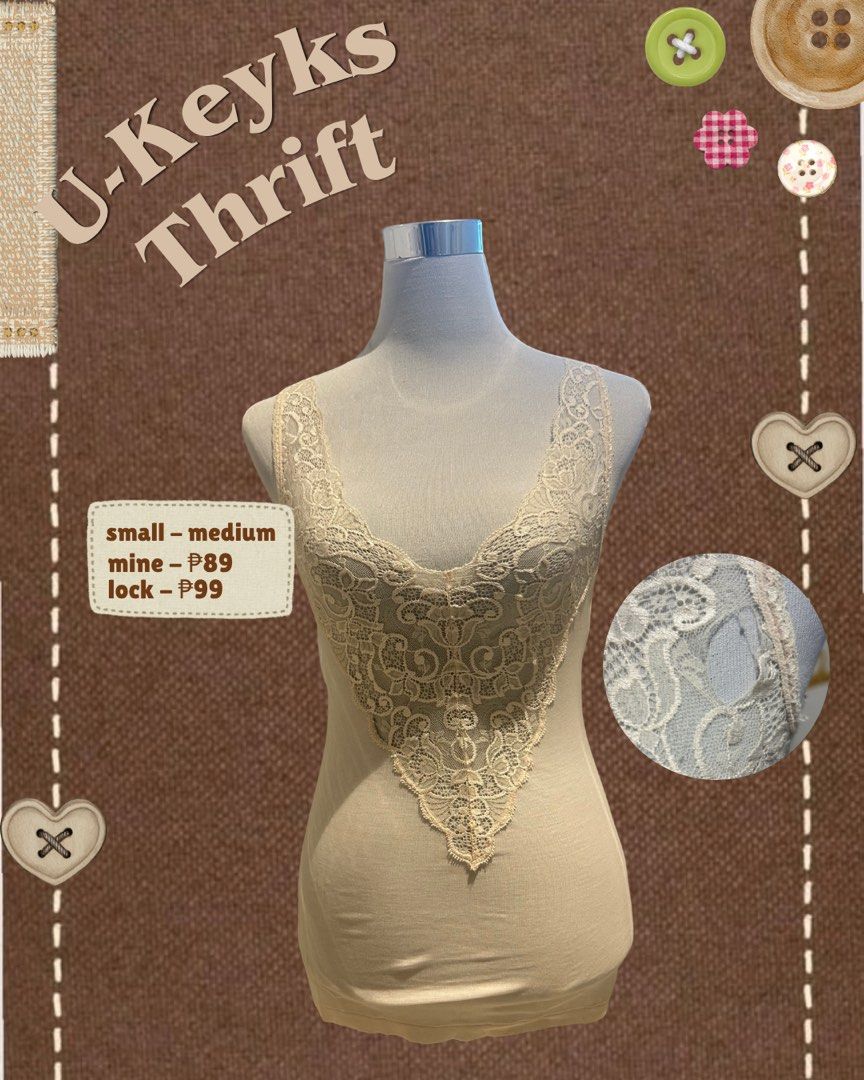 Beige Lace Tank Top Camisole (Small ~ Medium) (Category: Sleeveless) located in Cavite. Submitted by ukeyks (Listing ID 1465710886, Image 2). Description: - Color: Beige - Style: Fitted camisole with deep V-neck and intricate floral lace trim - Size: Fits small to medium frames - Condition: Good, with a small tear near the shoulder strap (highlighted in close-up photo) .