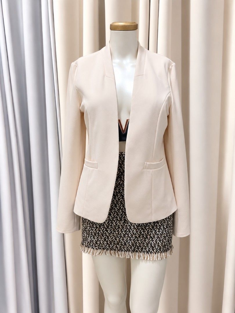 Beige Premium Blazer (Category: Coats, Jackets and Outerwear) located in Taguig. Submitted by vm.co (Listing ID 1461304813, Image 1). Description: Perfect for: • Corporate office wear • Business travel • Smart casual outfits • Rainy or cool weather • Capsule wardrobe • Everyday sophisticated styling Condition: Appears to be in very good preloved condition with no visible major stains, tears, or discoloration in the photo. A light steam will give 