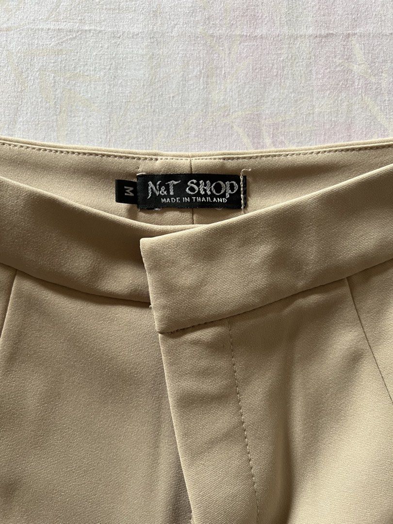 Beige Tailored Shorts Size M (Category: Shorts) located in Quezon City. Submitted by katedeclutter (Listing ID 1465598906, Image 2). Description: - Brand: N&T Shop (BKK store) - Size: M (25-26).
