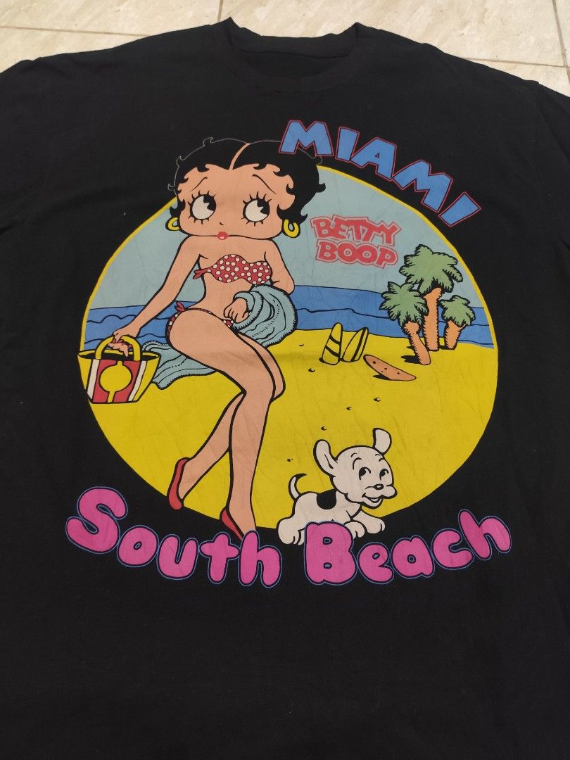 Betty Boop South Beach (Category: Tshirts & Polo Shirts ) located in Manila. Submitted by buyybustt (Listing ID 1465696336, Image 2). Description: 28.5x21 (Random Tag) 10/10 Conditon.