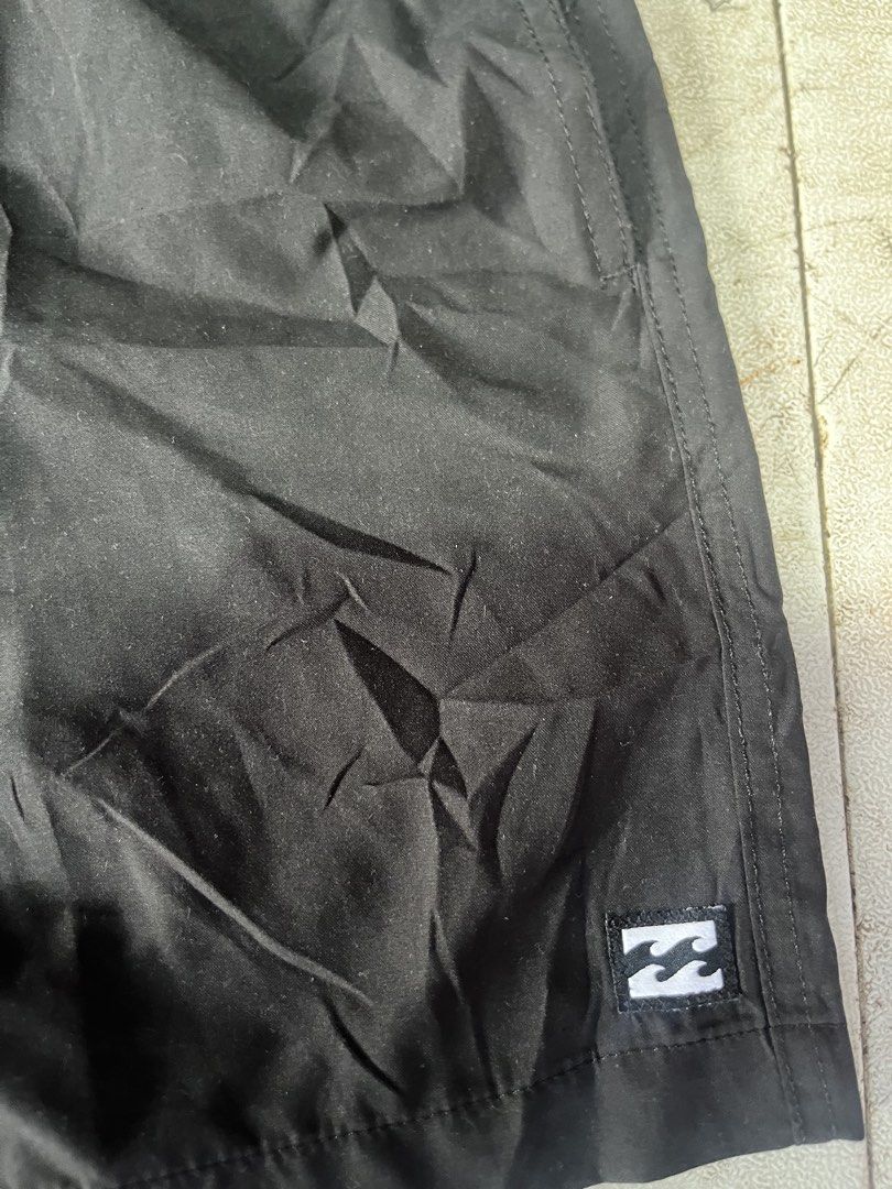Billabong All Day Layback Board Shorts Black (Category: Swim Trunks & Board Shorts) located in Lapu Lapu. Submitted by vanzfinds_16 (Listing ID 1465689003, Image 3). Description: - Brand: Billabong - Model: All Day Layback Board Shorts - Color: Solid Black - Waistband: Elastic with matching black drawstring - Details: Small white wave logo patch on lower left leg - Material: Eco-friendly recycled fabric (Recycle All Day Layback) - Perfect for: Be