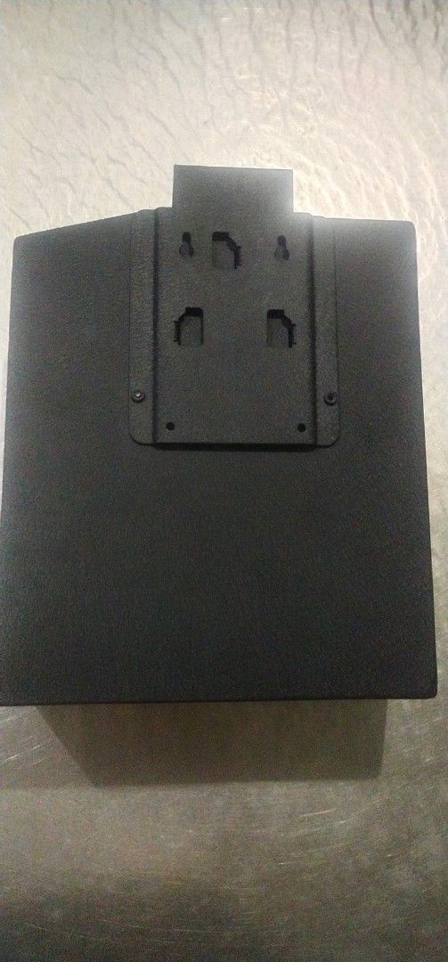 Biometric safe box with digital keypad and manual keys (Category: Safe) located in Muntinlupa City. Submitted by grayfox05 (Listing ID 1465710080, Image 3). Description: - Sleek black metal safe box in flawless, scratch-free condition - Advanced biometric fingerprint scanner and numbered keypad (1-4) - Versatile installation with a top mounting bracket and back panel screw slots - Includes 2 backup metal keys on a keyring - Ideal for securing cas