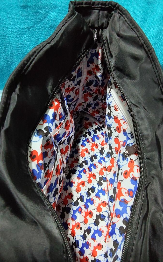 Black Añelló Tote Mlckèy Bag (Category: Shoulder Bags) located in Las Pinas. Submitted by jpmshoppe (Listing ID 1465675929, Image 3). Description: FPO Anèlló black mlckèy shoulder bag with sling strap OG 100% very good quality Black in color size is L13" x H 11.5" x W 5" with 1 zipper pocket and 2 open pockets inside.