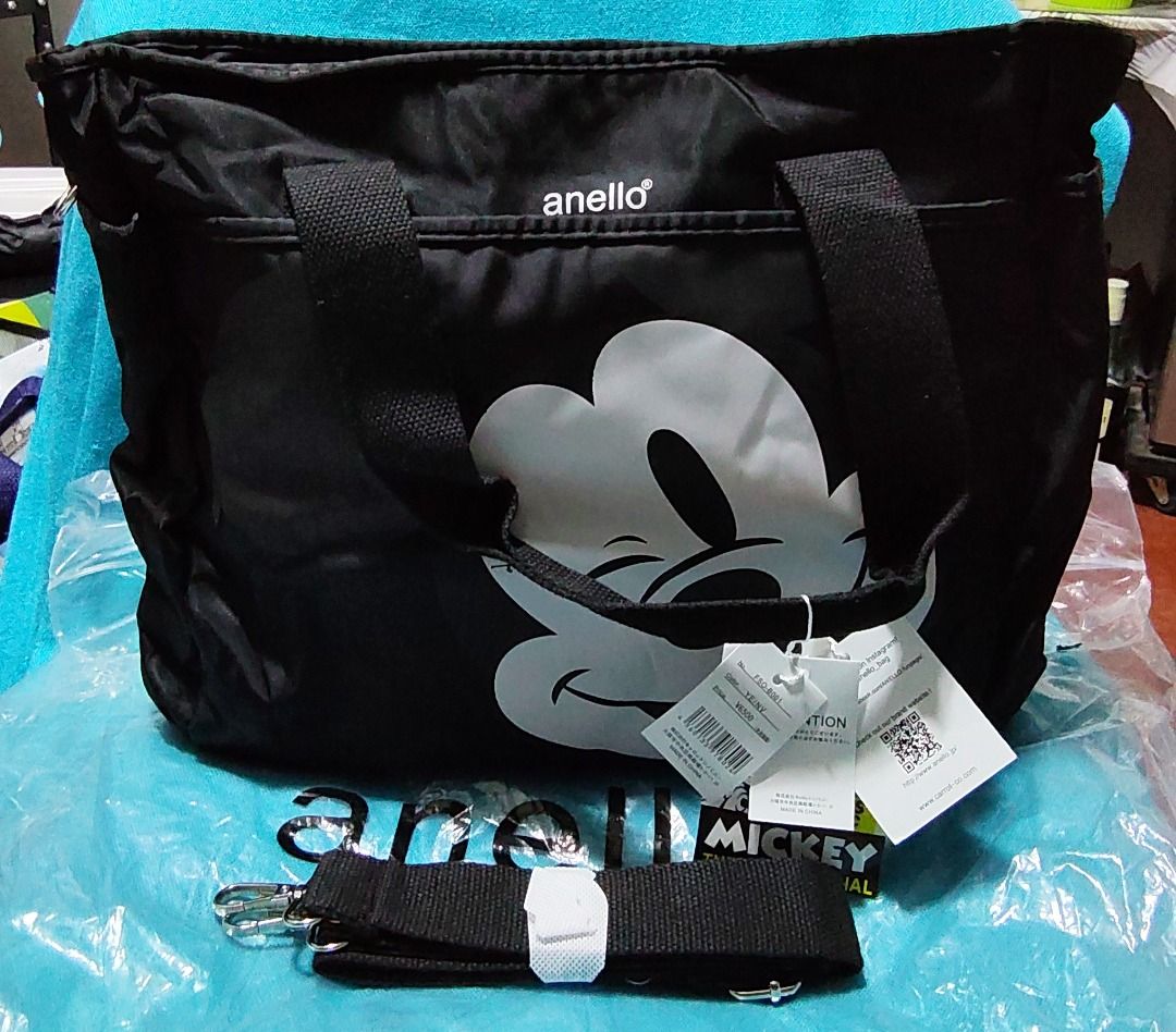 Black Añelló Tote Mlckèy Bag (Category: Shoulder Bags) located in Las Pinas. Submitted by jpmshoppe (Listing ID 1465675929, Image 1). Description: FPO Anèlló black mlckèy shoulder bag with sling strap OG 100% very good quality Black in color size is L13" x H 11.5" x W 5" with 1 zipper pocket and 2 open pockets inside.