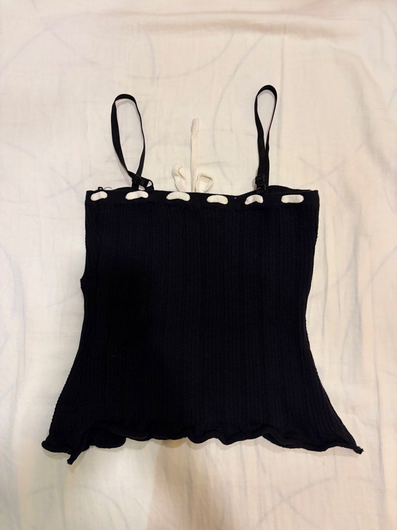 Black and white string knit top (Category: Sleeveless) located in Paranaque City. Submitted by mary_jj (Listing ID 1465672487, Image 3). Description: Size: XS-M (fits 32-36 inch bust). adjustable spaghetti straps .