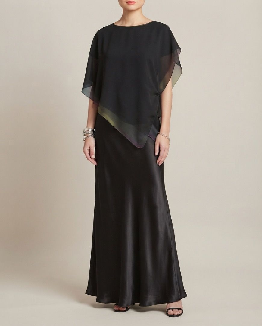 BLACK ASYMMETRICAL CHIFFON BLOUSE (Category: Blouses) located in Marikina City. Submitted by minimalistmanila (Listing ID 1465655882, Image 1). Description: Imported new black chiffon asymmetrical blouse with attached inner top. Medium. Pair with skirt or pants. Order now!.