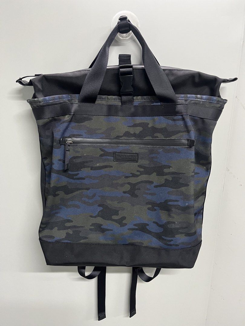 BLACK LABEL CRESTBRIDGE Camo Backpack (Category: Backpacks) located in Valencia. Submitted by shopstnd (Listing ID 1465678420, Image 1). Description: BLACK LABEL CRESTBRIDGE Camo Backpack Blue camo backpack with a clean utility-inspired design, perfect for everyday use and streetwear fits. Condition: 8/10 Color: 9/10 •Blue camo pattern with BLACK LABEL CRESTBRIDGE branding •Multiple zip compartments & pockets Adjustable backpack straps with top c