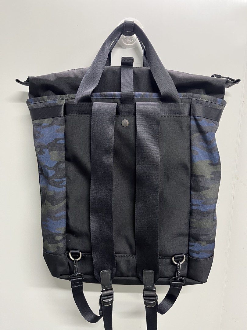 BLACK LABEL CRESTBRIDGE Camo Backpack (Category: Backpacks) located in Valencia. Submitted by shopstnd (Listing ID 1465678420, Image 2). Description: BLACK LABEL CRESTBRIDGE Camo Backpack Blue camo backpack with a clean utility-inspired design, perfect for everyday use and streetwear fits. Condition: 8/10 Color: 9/10 •Blue camo pattern with BLACK LABEL CRESTBRIDGE branding •Multiple zip compartments & pockets Adjustable backpack straps with top c