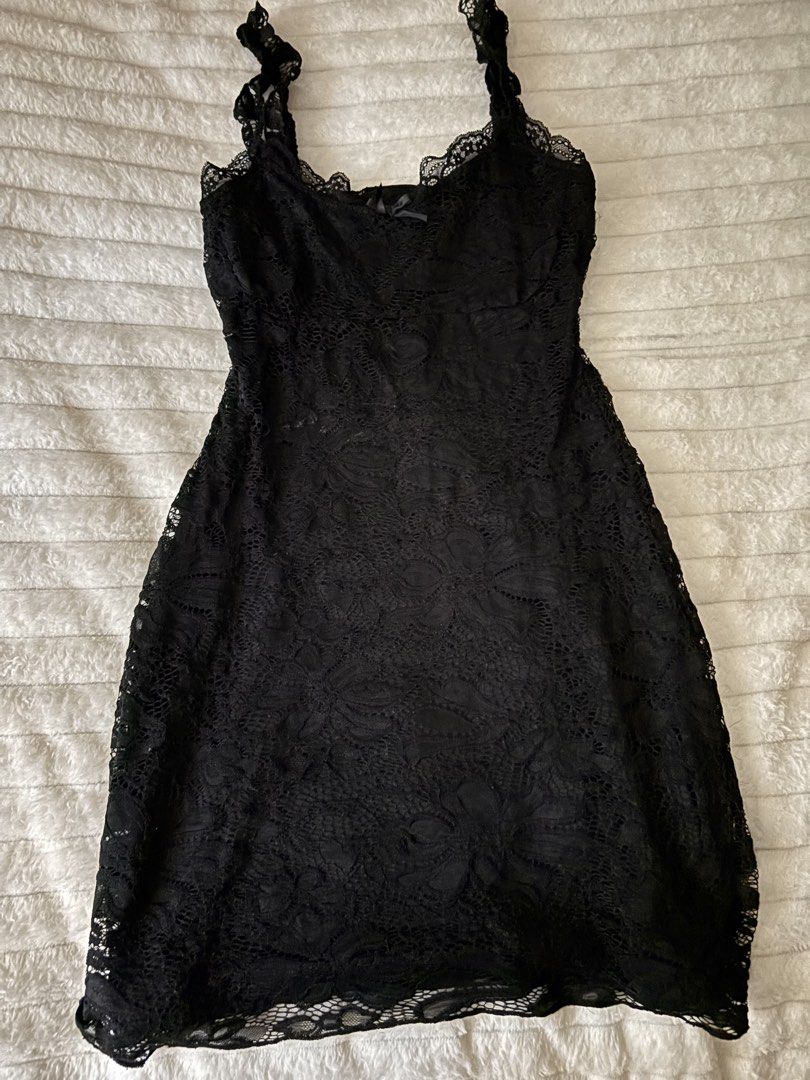 Black Lace Slip Dress (Category: Dresses) located in Quezon City. Submitted by hadescloset (Listing ID 1465651080, Image 1). Description: - Can fit XS- M - Can negotiate the price 🛒 shop more to get more discounts and freebies! - Style: Black floral lace mini dress - Details: Spaghetti straps, scalloped neckline trim, and cute center bow accent - Lining: Fully lined with soft, stretchy fabric (not see-through) - Occasion: Perfect for parties, da