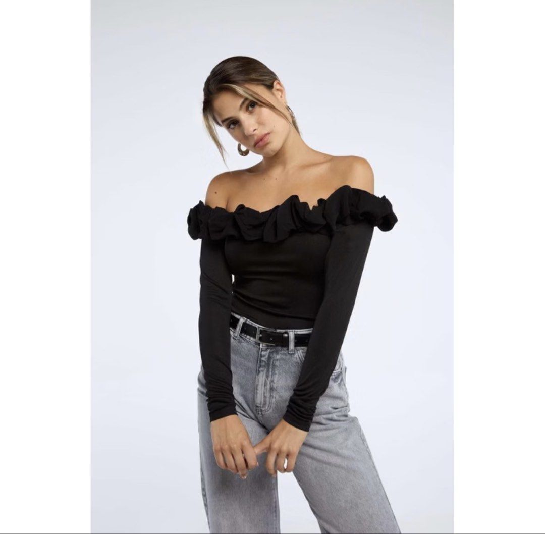 Black off-shoulder long sleeve top with ruffles (Category: Longsleeves) located in Manila. Submitted by kimchimie (Listing ID 1465656727, Image 1). Description: - never been used - no issue - pm for the actual pic mga sis - ganda ng fabric!! .