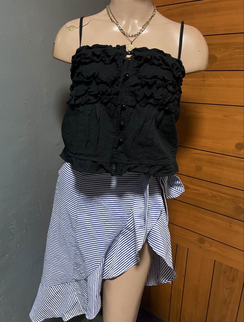 Black Ruffled Coquette Button-Front Tank Top Cami XS-S (Category: Sleeveless) located in Calamba. Submitted by goldenprngs101 (Listing ID 1465720498, Image 2). Description: Ruffled Coquette Cami Top Bring out your inner doll with this gorgeous tiered ruffle cami! Perfect for pairing with your favorite wrap skirts, denim, or balletcore looks. 🖤 🎀 Features & Fit: • Bust: 32” (with stretch) • Length: 12” (measured from top tube down) • Tiered ruff