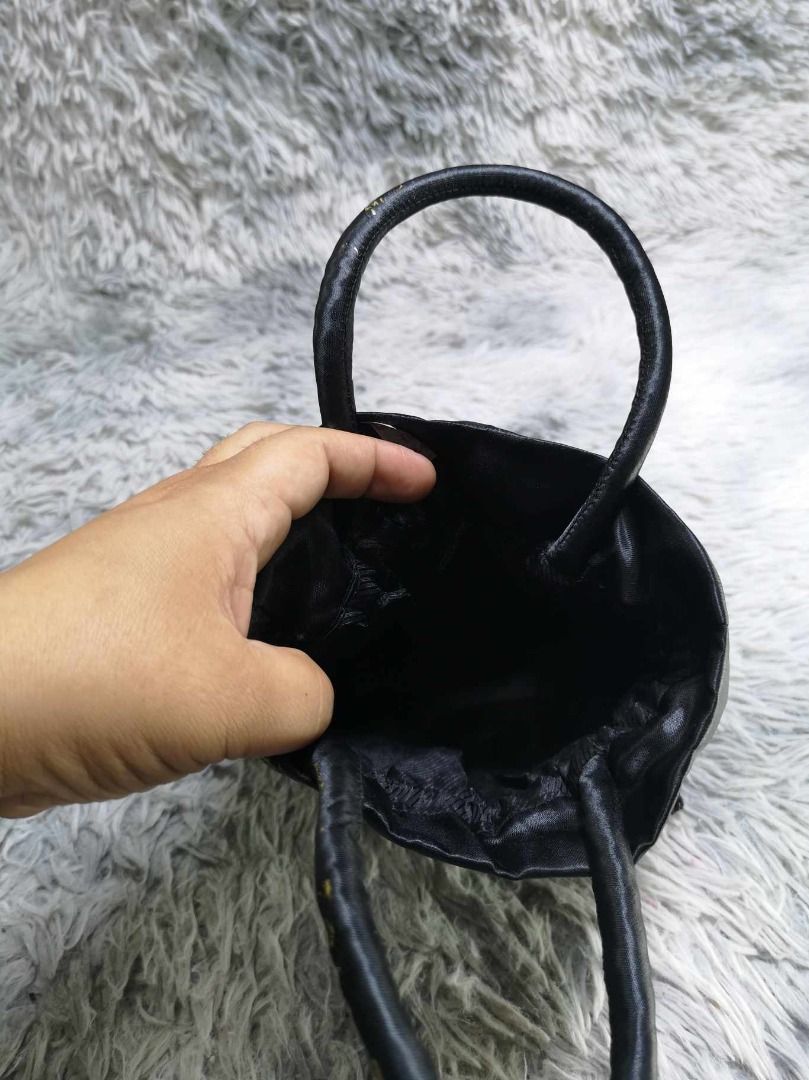 Black Satin Classic Dumpling Hand Bag (Category: Purses & Pouches) located in Santa Cruz. Submitted by jmy_surplus.2 (Listing ID 1465688051, Image 2). Description: Size ; L - 7.6 W - 8.4 Color ; Black Type ; Hand bag Brand ; No brand Material ; Synthetic Style ; Black Drawstring Satin hand bag LR 129 JMY 5 Batch #224.