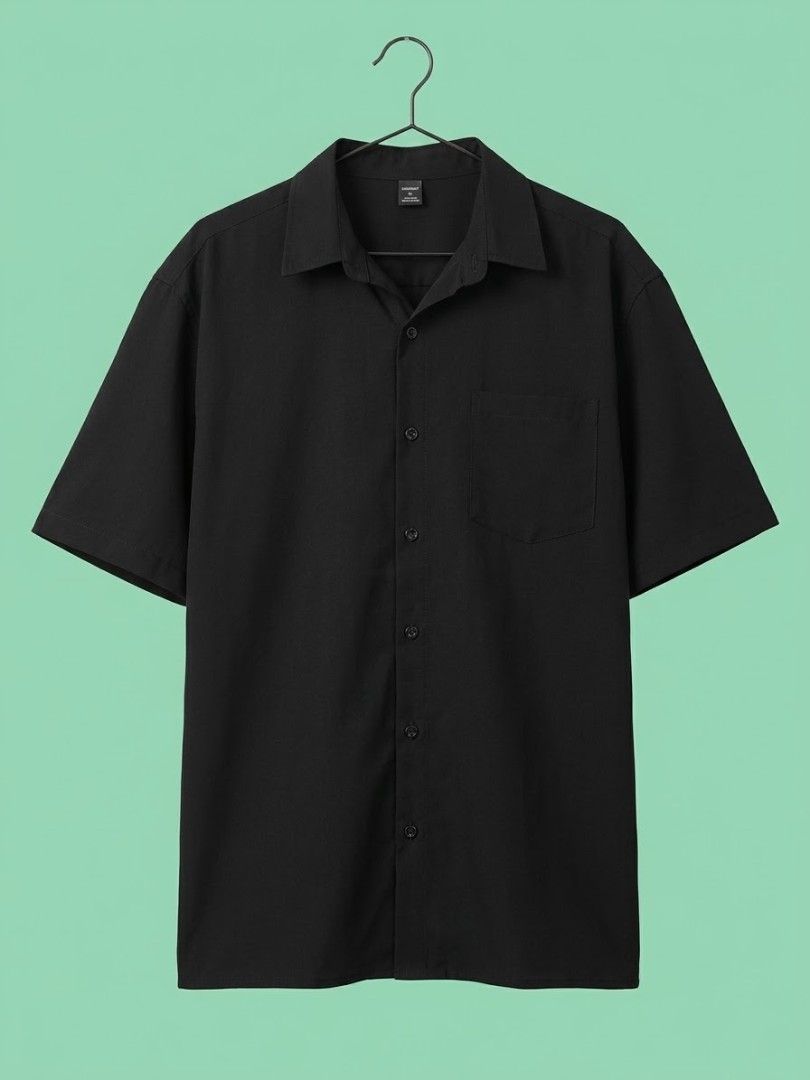 Black Short Sleeve Button-Up Shirt (Category: Shirts) located in Manila. Submitted by elvmoo (Listing ID 1465739219, Image 1). Description: too big, worn once only. good as new. 📍nangka, marikina.
