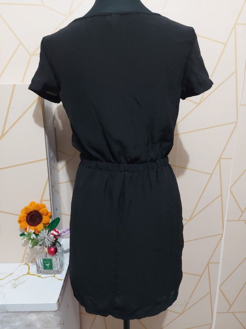 Black Short Sleeve Dress Size S (Category: Dresses) located in Manila. Submitted by jollyann_b1990 (Listing ID 1465633029, Image 3). Description: - Brand: Xhilaration - Size: Small - Color: Black - Features: Elastic waist, front zipper detail at neckline, left chest pocket - Fabric: Lightweight and comfortable - Condition: Clean, excellent overall condition - Style: Casual daily wear.