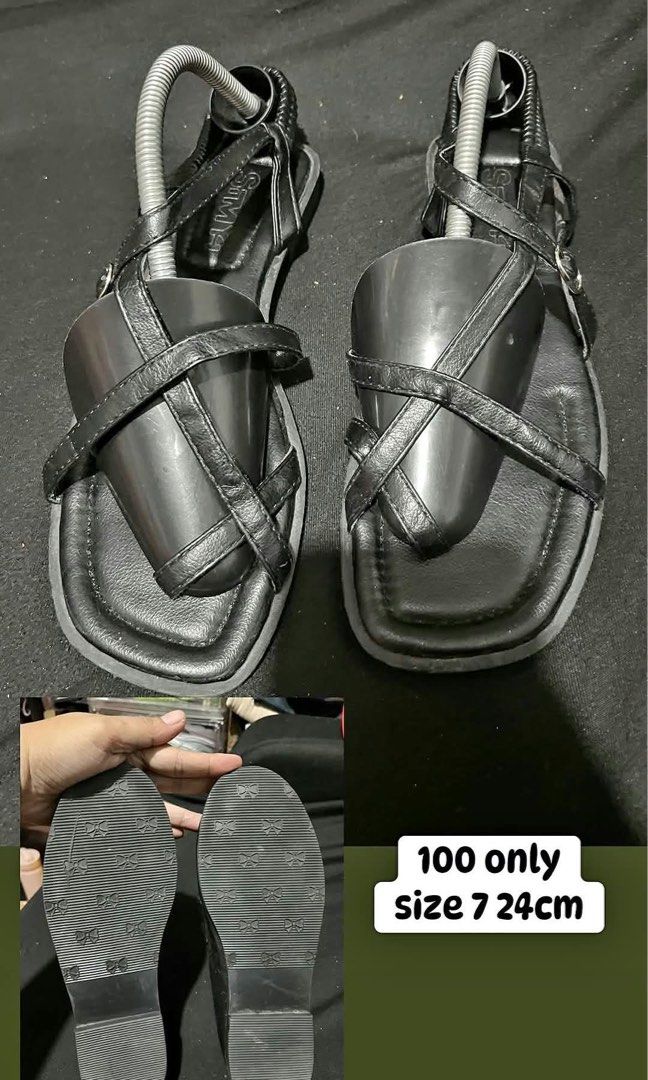 Black Strappy Sandals Size 7 24cm (Category: Flats & Sandals) located in Manila. Submitted by kiyanna.preloved (Listing ID 1465699577, Image 1). Description: - Style: Chic black strappy sandals with square toes and criss-cross design - Fit: Size 7 (fits 24cm feet), slip-on style for easy wear - Features: Rubber soles with cute ribbon pattern texture for added grip - Versatility: Perfect for daily outfits and casual lakads - Price: Only ₱100!.