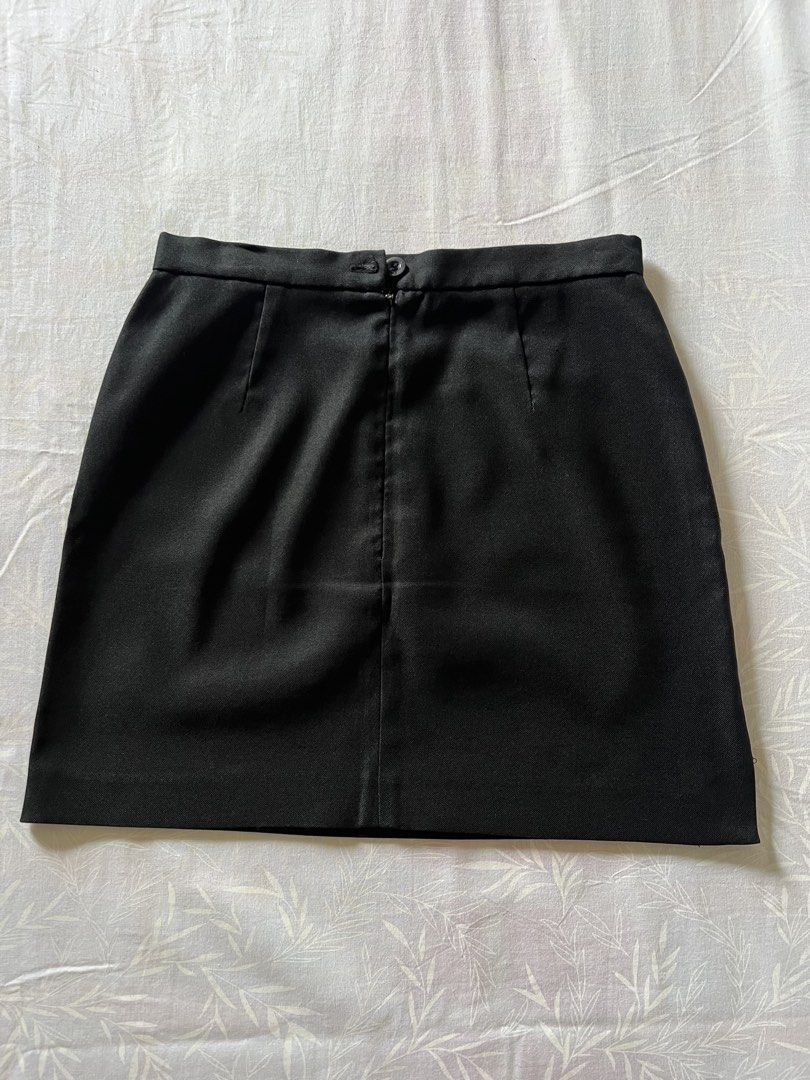 Black tailored mini skirt (Category: Skirts) located in Quezon City. Submitted by katedeclutter (Listing ID 1465602174, Image 2). Description: - Color: Solid Black - Size: 24-25.