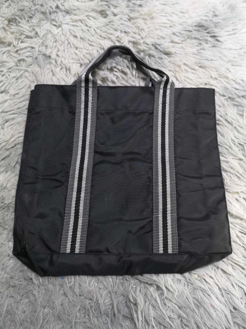 Black With Vertical Striped Design Tote Bag (Category: Tote Bags) located in Santa Cruz. Submitted by jmy_surplus.2 (Listing ID 1465688427, Image 1). Description: Size ; L -10.4 W - 11 Color ; Black Type ; Tote Bag Brand ; No brand Material ; Nylon Style ; Black Tote bag LR 129 JMY 5 Batch #224.
