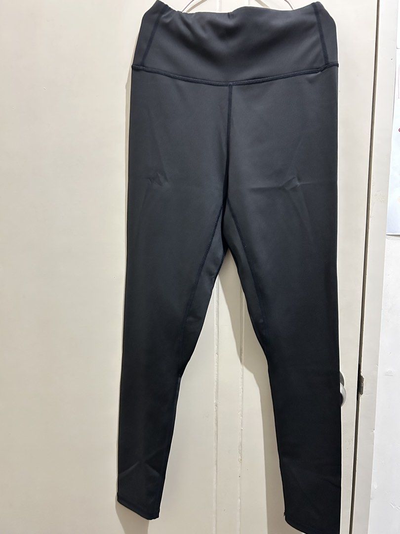 Black Workout Leggings Size M (Category: Activewear) located in Manila. Submitted by frances_001 (Listing ID 1465692188, Image 1). Description: - Color: Solid black - Size: M (160/70A) - Material: 82.5% polyester, 17.5% elastane (super stretchy) - Fit: High-waisted with supportive front stitching - Condition: Brand new with tags intact - Versatile for workouts or daily casual wear.