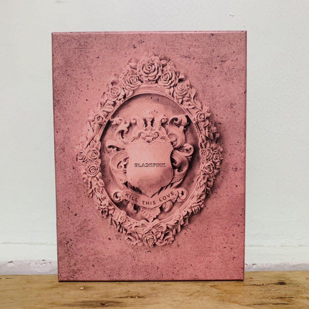 BLACKPINK Kill This Love Album CD (Category: CDs & DVDs) located in Caloocan City. Submitted by offthegridfinds (Listing ID 1465757106, Image 1). Description: - Item: BLACKPINK Mini Album - Kill This Love (Pink Version) - Inclusions: Pink outer box with embossed rose frame and matching pink CD - Condition: Good, with minor shelf wear on outer corners from storage - Features: Tracklist, barcode, and authentication sticker on the back - Perfect for