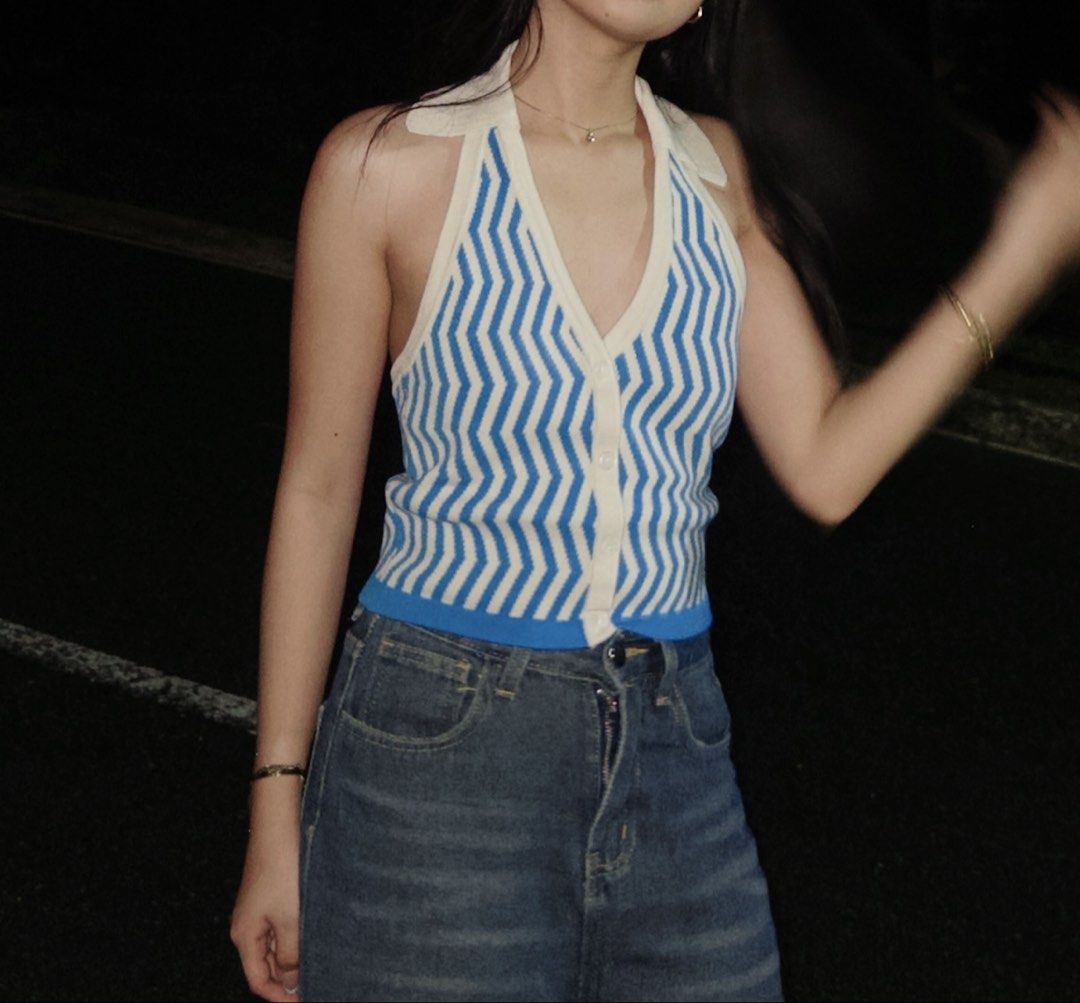Blue and white zig-zag halter top (Category: Sleeveless) located in Paranaque City. Submitted by rojellemarasigan (Listing ID 1465579331, Image 1). Description: - Bought in Sydney 🇦🇺 - Design: Blue and white zig-zag knit pattern with a chic collar and button front - Fit: Fitted cut that flatters your silhouette - Style: Vibrant striped summer piece - Pairing: Easily styled with high-waisted denim jeans - Condition: Brand new / Excellent (ready 