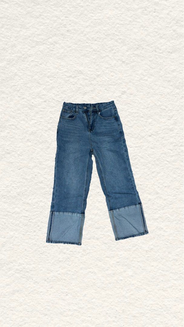 Blue Denim Jeans with Cuffed Hem (Category: Jeans) located in Quezon City. Submitted by zealhorse_a9f3c3 (Listing ID 1465620446, Image 1). Description: - Style: Mid-rise, straight leg, medium wash denim - Detail: Trendy wide cuffed hems - Features: Standard belt loops, traditional five-pocket styling, front zip fly with button closure - Condition: Normal wear, super comfortable for daily outfits.