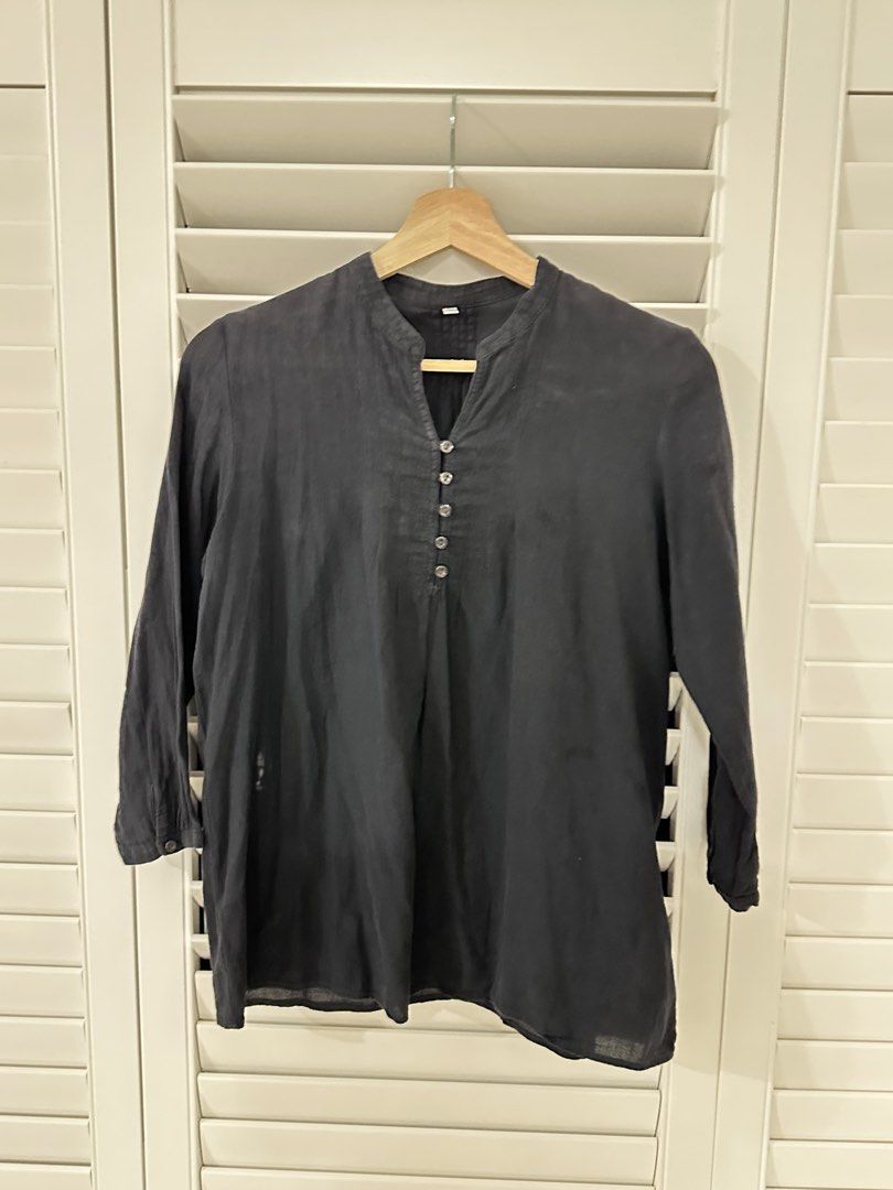 Blue Snowflake Pattern Button-Down Blouse (Category: Blouses) located in Singapore. Submitted by kindermum (Listing ID 1465699877, Image 4). Description: - Color & Pattern: Dark blue with all-over snowflake print - Material: Lightweight, semi-sheer fabric - Sleeves: Three-quarter length with button cuffs - Collar: Rounded in front, band collar on the reverse - 9/10 condition for this blue collar button up Blouse - Muji Top Condition: Includes a s