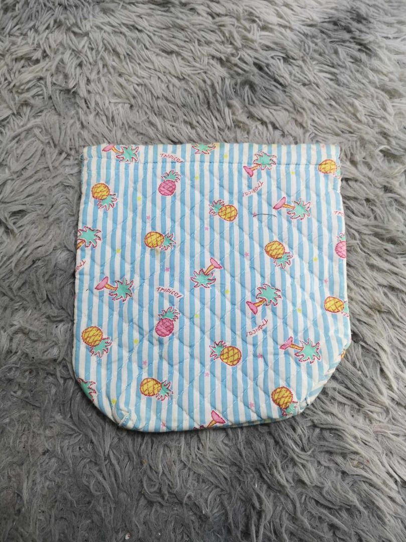 Blue Stripe With tropical Pineapple Print Pouch (Category: Purses & Pouches) located in Santa Cruz. Submitted by jmy_surplus.2 (Listing ID 1465688251, Image 1). Description: Size ; L - 9.4 W - 9 Color ; Blue , White Type ; Pouch Brand ; No brand Material ; Cotton Style ; Quilted fabric Pouch LR 129 JMY 5 Batch #224.