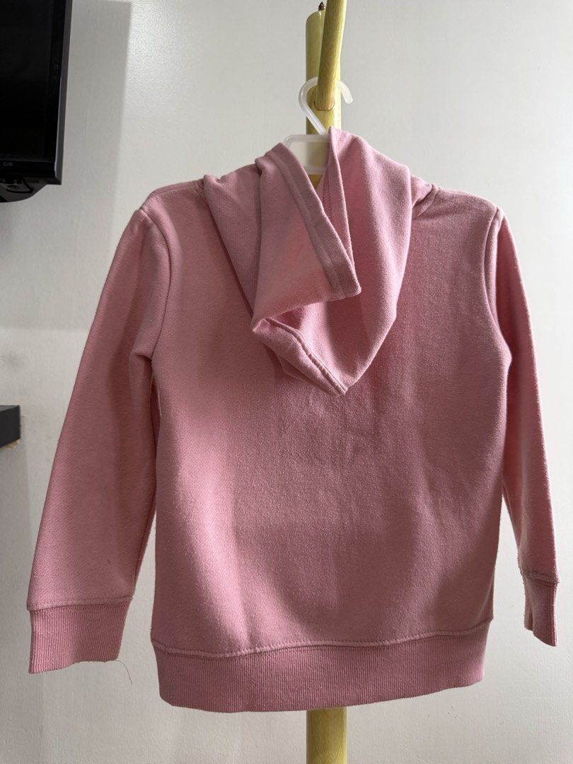 Bluey Pink Hoodie Size 4 (Category: Babies & Kids Fashion) located in Quezon City. Submitted by warmrabbit_414908 (Listing ID 1465758158, Image 2). Description: - Item: Pink Bluey & Bingo Hugging Hoodie - Size: 4 - Features: Cute front graphic with hearts, cozy fleece lining inside, long sleeves with ribbed cuffs and hem, safe drawless hood - Brand: Official Bluey branded neck tag - Condition: Minor wash wear on fabric, still very warm and wearab
