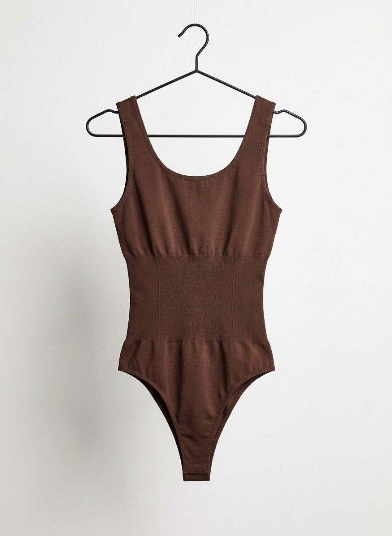 Bodysuit Bundle Pack - Brown and Black Tank Tops (Category: Sleeveless) located in Cavite. Submitted by mypreloved_cavite (Listing ID 1465641391, Image 1). Description: Fits XS\S Bust: 30-36 Waist: 24-29 Two scoop neck bodysuits, one brown and one black. Racerback design on the black one, wide straps on the brown one. Ribbed texture through the center panel. Snap button closure at the bottom. Great basics for everyday layering..
