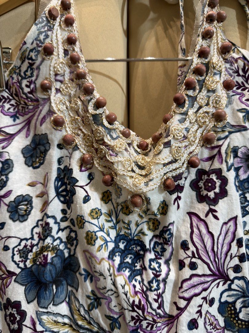 Boho Style Halter Top (Category: Sleeveless) located in Manila. Submitted by glamstylemnl (Listing ID 1465636121, Image 3). Description: ♡ SIZE: XS-S ♡ BUST: 28-32 ♡ Swipe left to see the actual color & details ♡ floral patterns / wooden bead accents along neck and hem / crocheted lace trimming at the bottom ♡ HQ • 10/10 ♡ Ready to wear 👚.