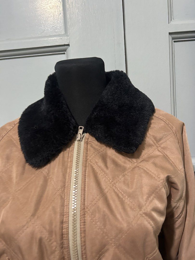 Bomber Jacket with Faux Fur Collar (Category: Coats, Jackets and Outerwear) located in Manila. Submitted by yuShin09 (Listing ID 1465629680, Image 3). Description: - Tan quilted suede bomber jacket with a short cropped fit can fit up to medium perfect for Travel - Well used the black parts are a bit dark gray - Contrast black faux fur collar can work as bomber jacket or winter jacket removable collar - Two front flap pockets secured with brown bu