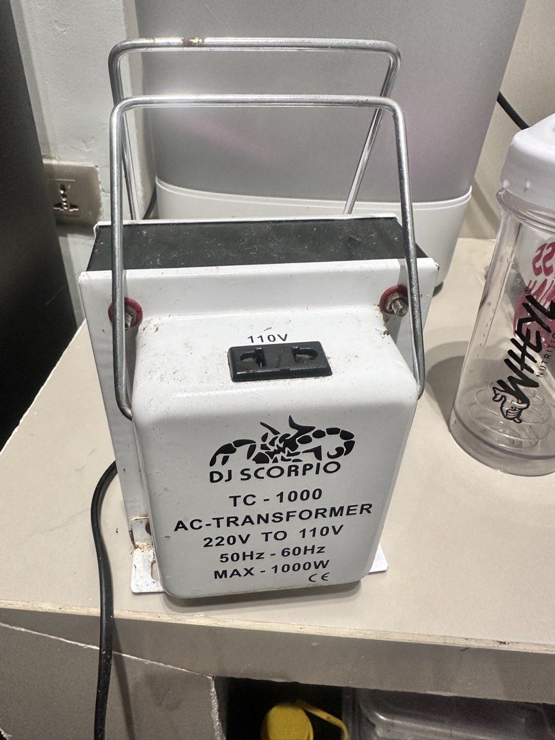 Bottle Sterilizer with DJ Scorpio AC Transformer Bundle (Category: Breastfeeding & Bottle Feeding) located in Pasig City. Submitted by cassydeclutter (Listing ID 1465626146, Image 3). Description: - White and grey electric bottle sterilizer bundle - Includes DJ Scorpio TC-1000 AC step-down transformer (220V to 110V, up to 1000W capacity) - Ideal for running imported 110V appliances in the Philippines - Shows normal signs of previous handling and 