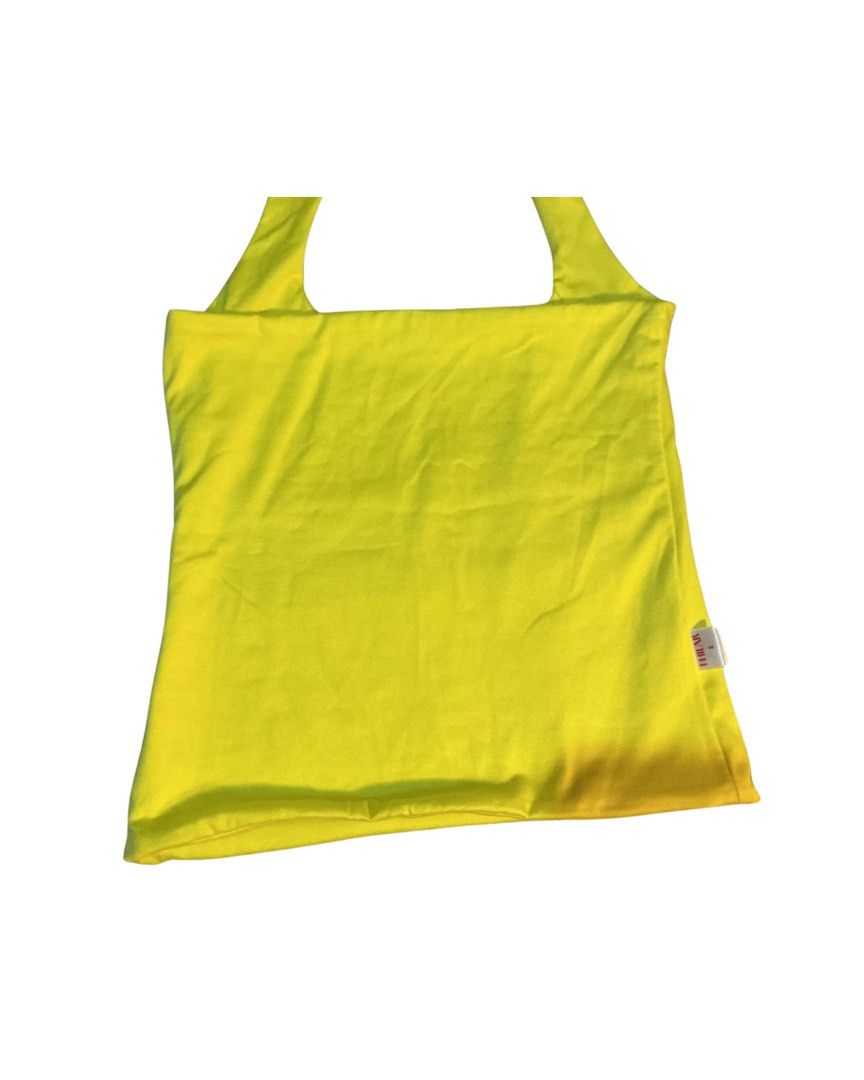 Bright Yellow Halter Top Size S (Category: Sleeveless) located in Bulacan. Submitted by whimsylilies (Listing ID 1465669613, Image 2). Description: - Brand/Size: FHILAR, Size S - Color/Style: Bright yellow halter top with a square neckline - Material: Lightweight, stretchy fabric - Condition: Great overall, but has an orange discoloration stain near the bottom right hem - Perfect for: Summer outfits or layering.