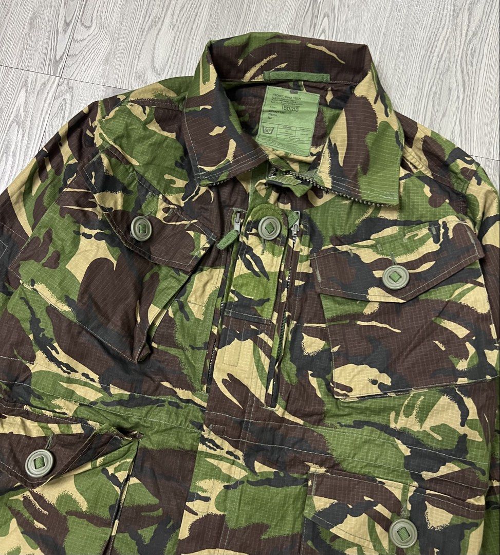 British Army DPM Camouflaged Field Jacket (Category: Coats, Jackets and Outerwear) located in Bacoor. Submitted by southlocalgarage (Listing ID 1465674490, Image 3). Description: British Army DPM Camouflaged Field Jacket Size on tag 160/88 Excellent condition No issue Actual dimes! Width-22 Length-30 Sleeve length-23 Armfit-18 Price 1850+sf Dm to Purchase📩.