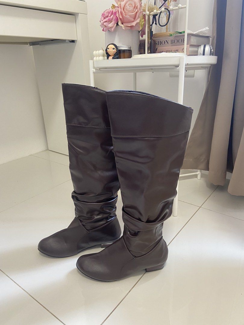 Brown Knee High Boots (Category: Boots) located in Cavite. Submitted by iveeshaine (Listing ID 1465596680, Image 3). Description: Size: 37 Never been used Loc: Silang, Cavite .