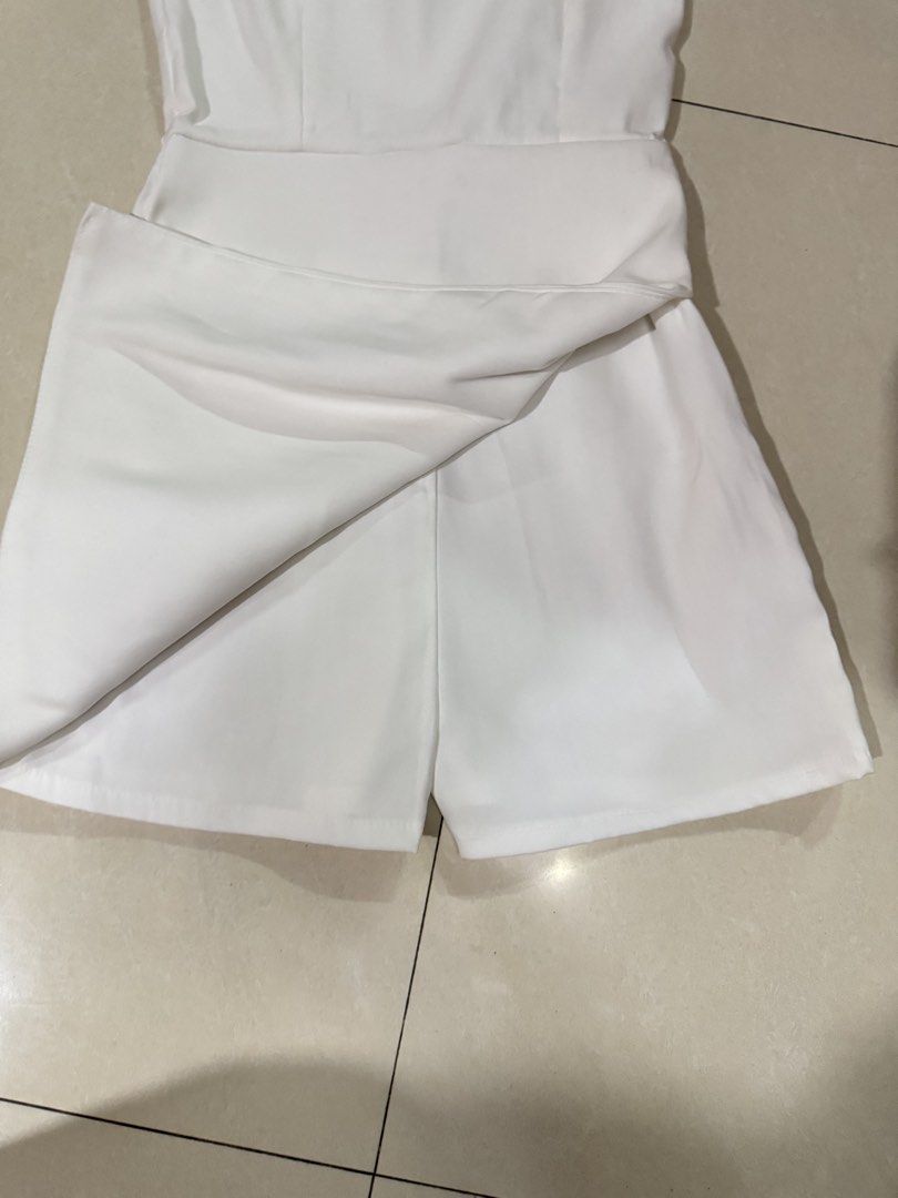BSCO White Strapless Asymmetrical Skort Romper Size Small (Category: Rompers) located in Quezon City. Submitted by sweetlyluxe (Listing ID 1465624106, Image 2). Description: - Brand: BSCO - Size: PH Small - Color: Plain solid white - Style: Strapless romper with an asymmetric front flap overlay (skort look) - Closure: Convenient side zipper - Condition: never worn - Origin: Made in the Philippines - party, garden party, isa the label, phia, miu t