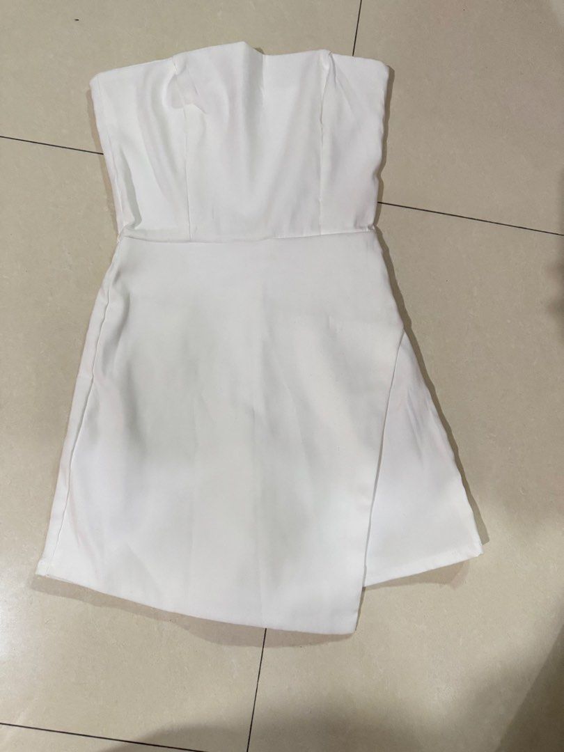 BSCO White Strapless Asymmetrical Skort Romper Size Small (Category: Rompers) located in Quezon City. Submitted by sweetlyluxe (Listing ID 1465624106, Image 1). Description: - Brand: BSCO - Size: PH Small - Color: Plain solid white - Style: Strapless romper with an asymmetric front flap overlay (skort look) - Closure: Convenient side zipper - Condition: never worn - Origin: Made in the Philippines - party, garden party, isa the label, phia, miu t