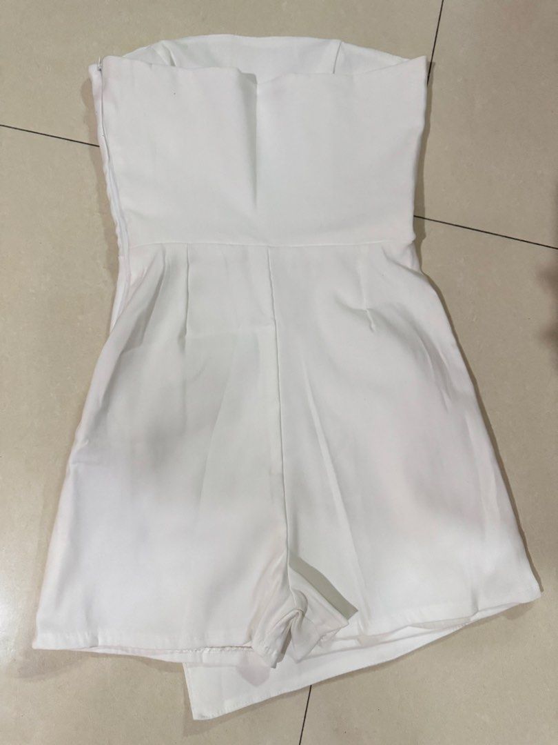 BSCO White Strapless Asymmetrical Skort Romper Size Small (Category: Rompers) located in Quezon City. Submitted by sweetlyluxe (Listing ID 1465624106, Image 3). Description: - Brand: BSCO - Size: PH Small - Color: Plain solid white - Style: Strapless romper with an asymmetric front flap overlay (skort look) - Closure: Convenient side zipper - Condition: never worn - Origin: Made in the Philippines - party, garden party, isa the label, phia, miu t