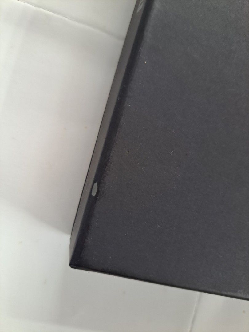 BTS World OST Album Set (Category: K-Wave Merchandise) located in Manila. Submitted by yselles__ (Listing ID 1465602331, Image 2). Description: - Official BTS World Limited Edition OST Album set - Includes photobook, CD, photocards, ticket, and coupon card - Comes in the original black outer box - Condition: Slight scuff mark on the outer box edge.