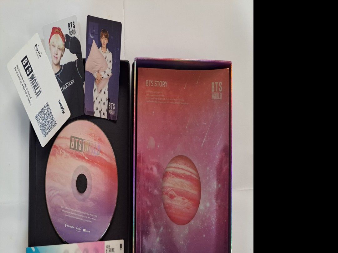 BTS World OST Album Set (Category: K-Wave Merchandise) located in Manila. Submitted by yselles__ (Listing ID 1465602331, Image 3). Description: - Official BTS World Limited Edition OST Album set - Includes photobook, CD, photocards, ticket, and coupon card - Comes in the original black outer box - Condition: Slight scuff mark on the outer box edge.