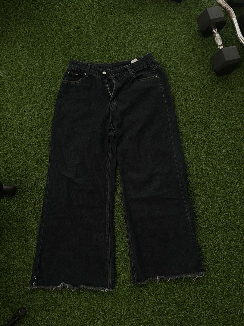 Bundle of 2 Black Denim Jeans (Category: Jeans) located in Las Pinas. Submitted by francesaly (Listing ID 1465704039, Image 3). Description: - Bundle of 2 stylish black denim jeans - Pair 1: Trendy wide-leg style with raw hem details - Pair 2: Fab. N' Gene brand with a cool distressed wash and frayed hems - Ultimate streetwear essentials - Great value bundle deal.