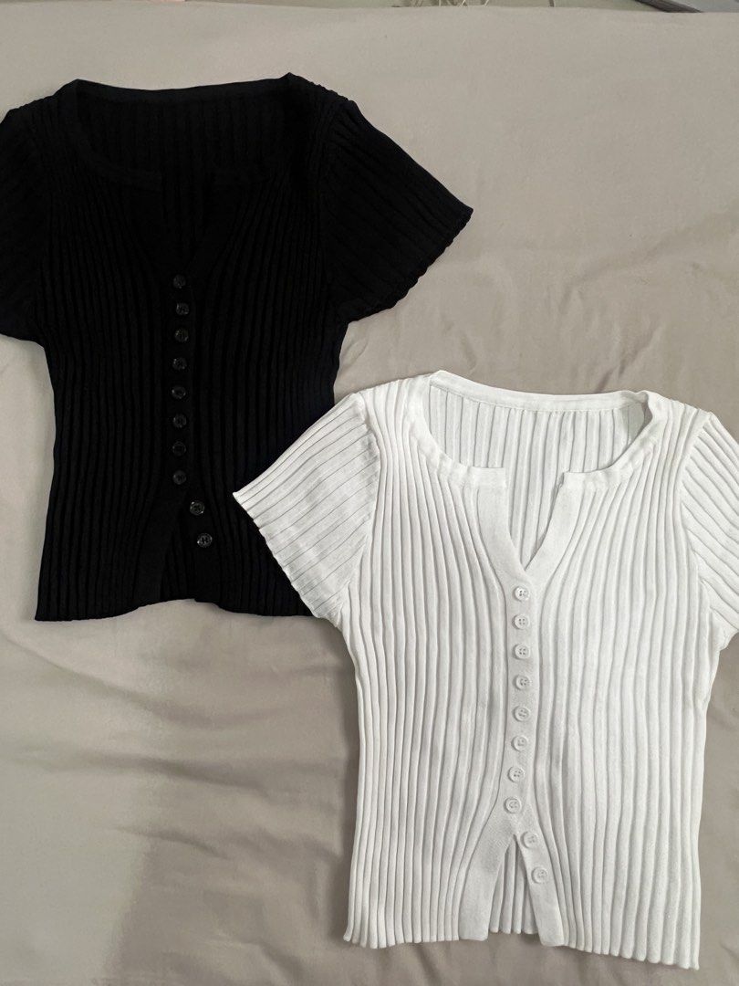 BUNDLE OF 2: Ribbed knit short sleeve button-up top bundle black white (Category: Blouses) located in Manila. Submitted by fairybunny13 (Listing ID 1465637813, Image 1). Description: - Set of 2 matching ribbed knit tops (Black and White) - Short sleeves with a chic scoop neckline and front button placket - Soft, stretchy fabric that hugs the body comfortably - Versatile basics great for layering or wearing solo - Budget-friendly bundle deal.