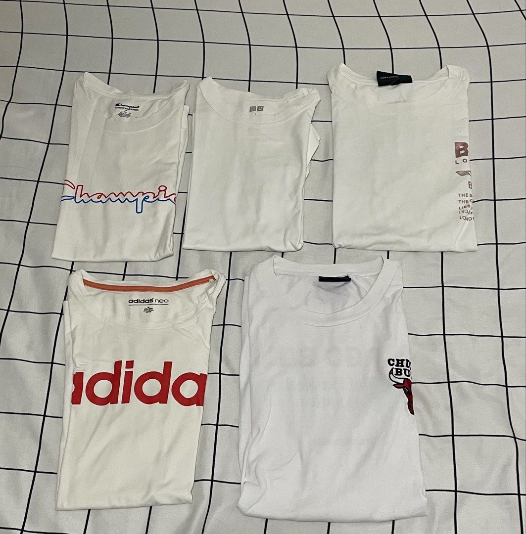 Bundle of 5 White T-Shirts (Category: Shirts) located in Tanauan. Submitted by elle0908 (Listing ID 1465597826, Image 1). Description: - Bundle of 6 branded t-shirts - Mixed sizes (refer to tags) SF: Shoulder by buyer. RFS: Closet decluttering, need to make space..
