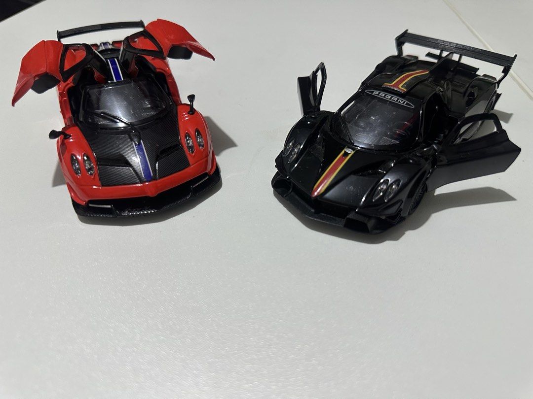 Bundle Pagani Diecast 1/32 Collectibles (Category: Vehicle & Diecast Models) located in Manila. Submitted by got_loots (Listing ID 1465639918, Image 2). Description: WTS❗️❗️❗️ Bundle Pagani Diecast 1/32 Collectibles Issue One door cant close, black Pagani ₱300 Only Set.