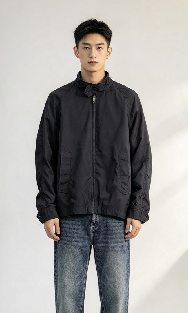 Burberry London Black Zip-Up Jacket (Category: Coats, Jackets and Outerwear) located in Paranaque City. Submitted by mykapoynton (Listing ID 1465682011, Image 1). Description: Burberry London Black Zip-Up Jacket - Color: Classic Black with iconic beige, black, and red check lining - Style: Zip-up jacket with mock neck collar and subtle checkered texture - Features: Front pockets, full metal zip closure, buttoned cuffs and back yoke - Versatility: