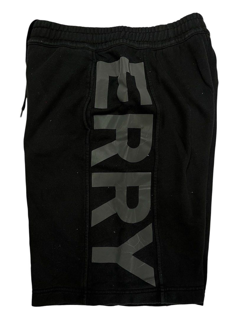 Burberry Sweatshorts (Category: Shorts) located in Baguio. Submitted by drwxrms (Listing ID 1465616892, Image 3). Description: Burberry Sweatshorts Spell out logo in reflective 3m print Excellent condition Issue* minimal crack print Small oversized 28-34x23.