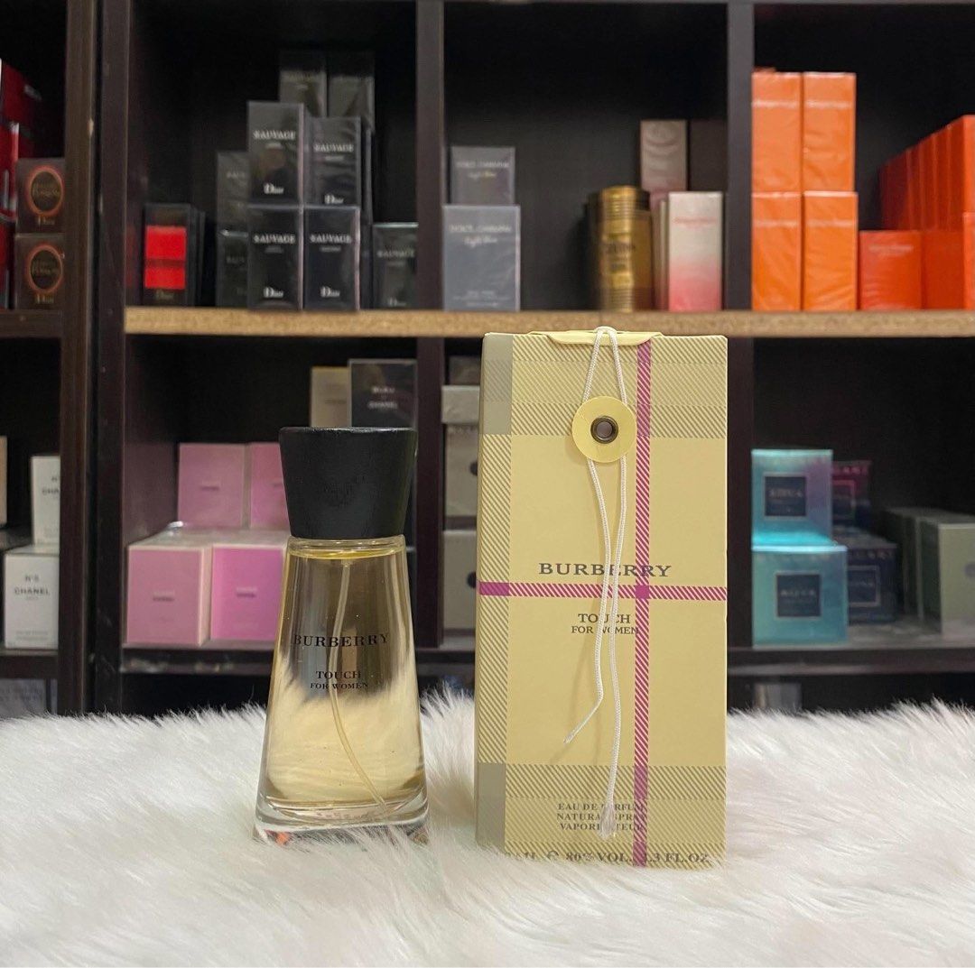 Burberry Touch For Women Eau De Parfum 100ml (Category: Fragrance & Deodorants) located in Taguig. Submitted by aizonlineshopph (Listing ID 1465634433, Image 1). Description: - Authentic Burberry Touch for Women - Eau de Parfum (EDP) concentration - Large 100ml bottle size (Full volume) - Includes original classic beige plaid box - Natural spray vaporisateur design - Clear glass bottle with elegant dark cap.