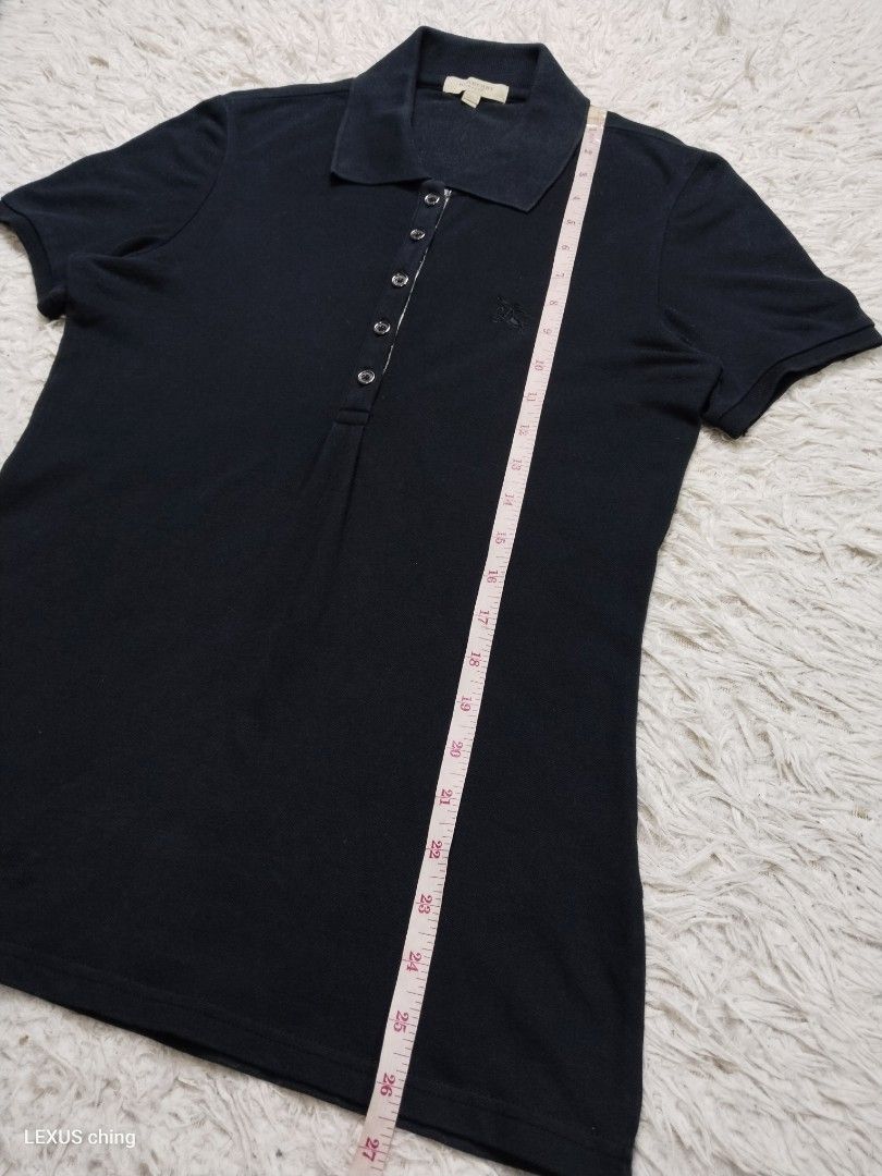 BURBERRY womens a multi button placket and small embroidered logo on chest, (Category: Shirts) located in Manila. Submitted by lexusthrift1995 (Listing ID 1465697178, Image 3). Description: Size- SMALL on tag Dimension- 17x26.5 Color rate- 9/10 Condition- 9/10 issue- inner lints but not visible. need wash good condition ‼️400pesos plus shipping fee 💸MODE OF PAYMENT- GCASH payment first 🚛MODE OF DELIVERY- J&T or LALAMOVE 📍LOCATION- NORTH CALOOC